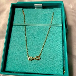 Tiffany’s 18k rose gold infinity necklace